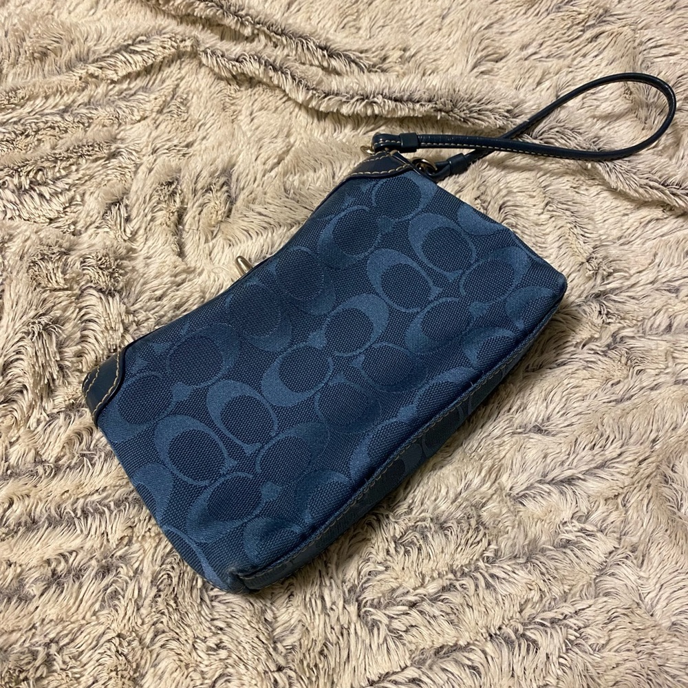 Coach blue wrist bag.
